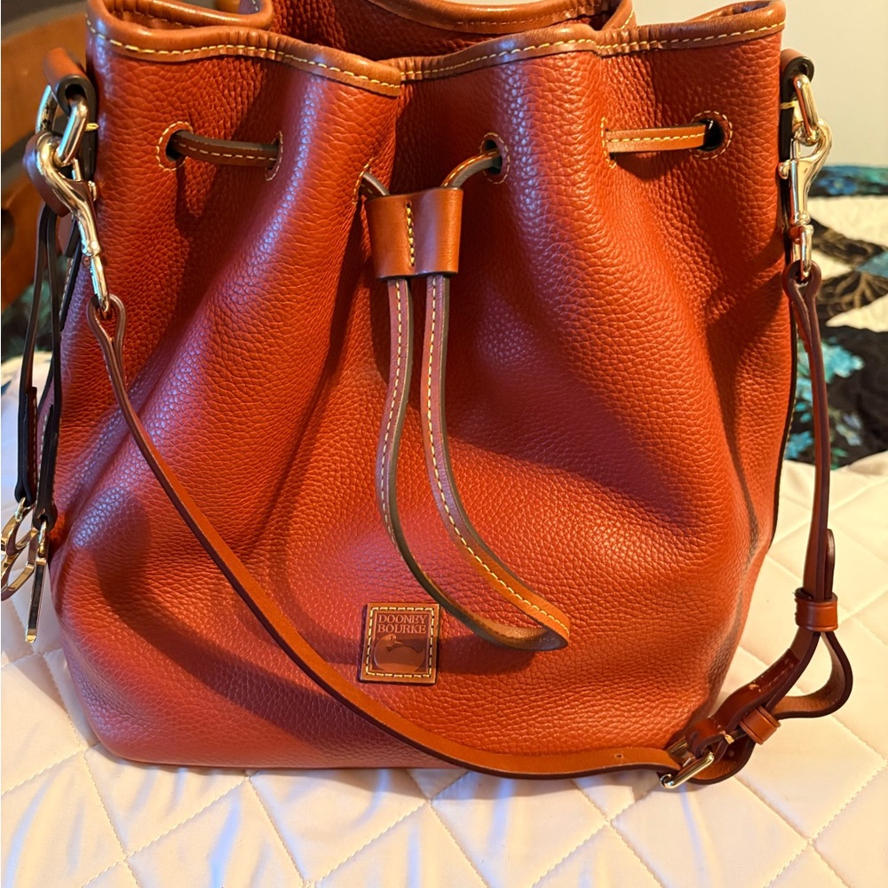 Dooney & Bourke Brown/orange Leather drawstring Shoulder Bag